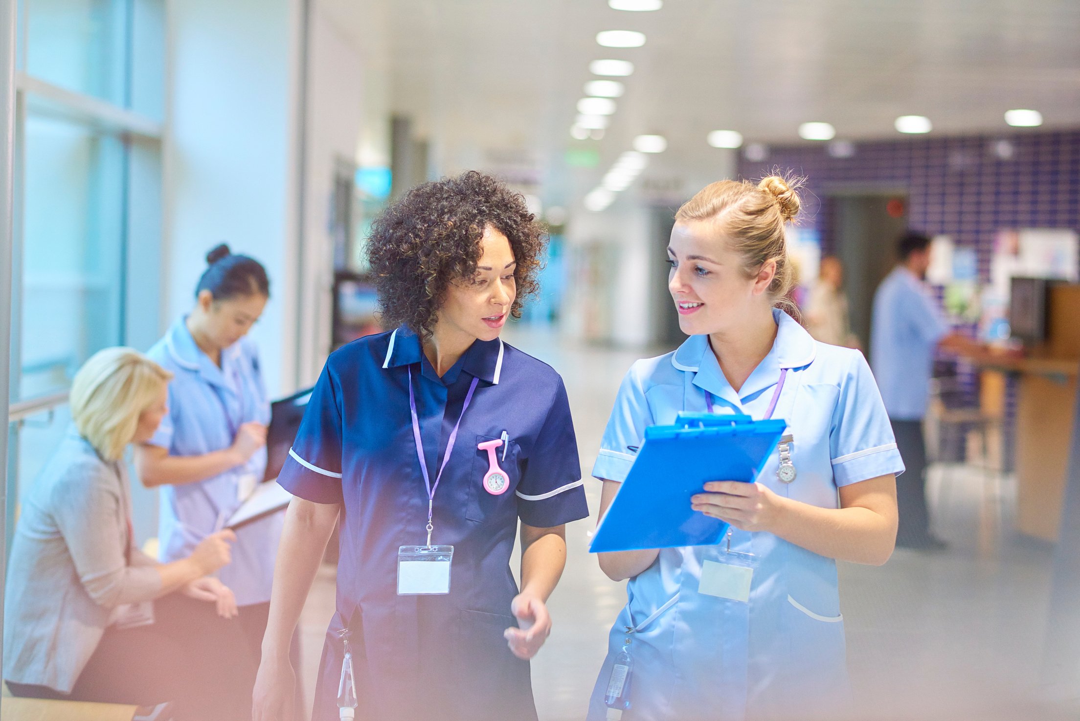 senior staff nurse with junior nurse